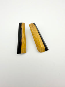 Pair of black and tan long wood stud earrings