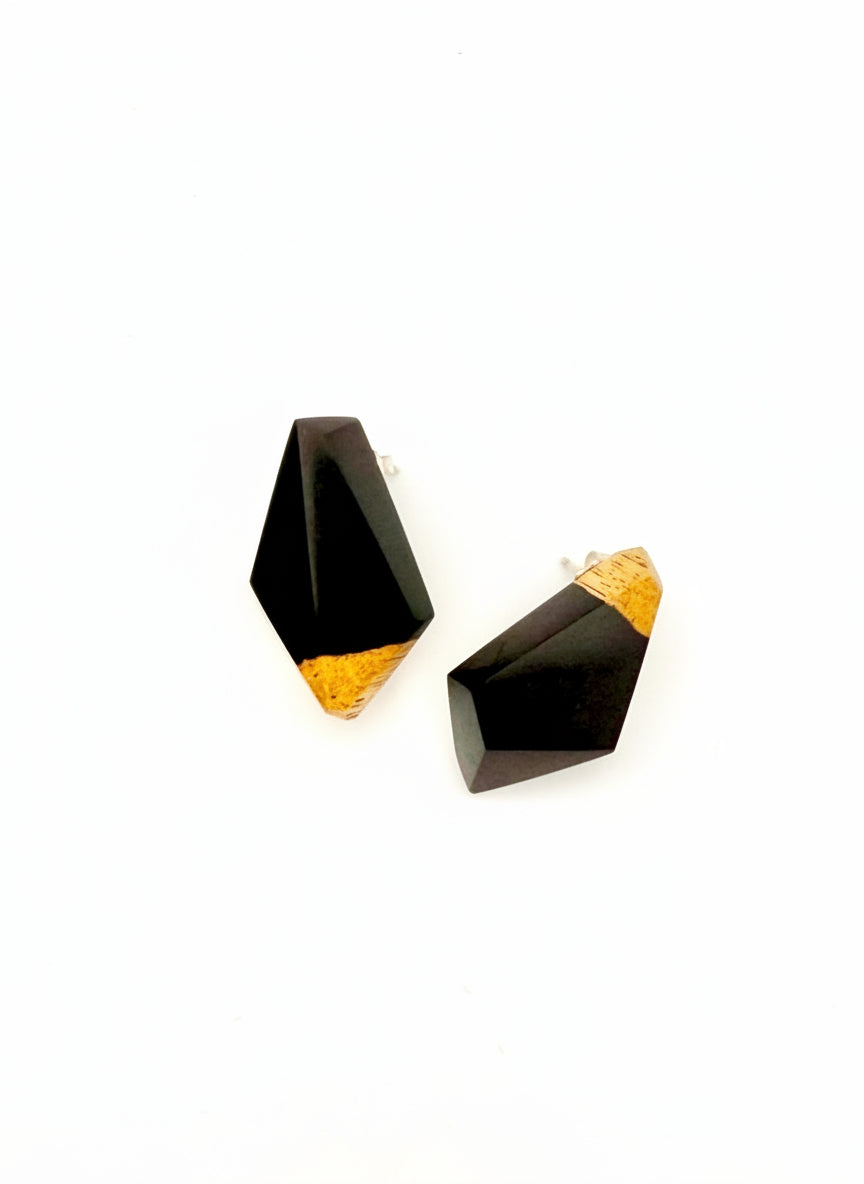 Black and gold wood geometric earrings on a white background