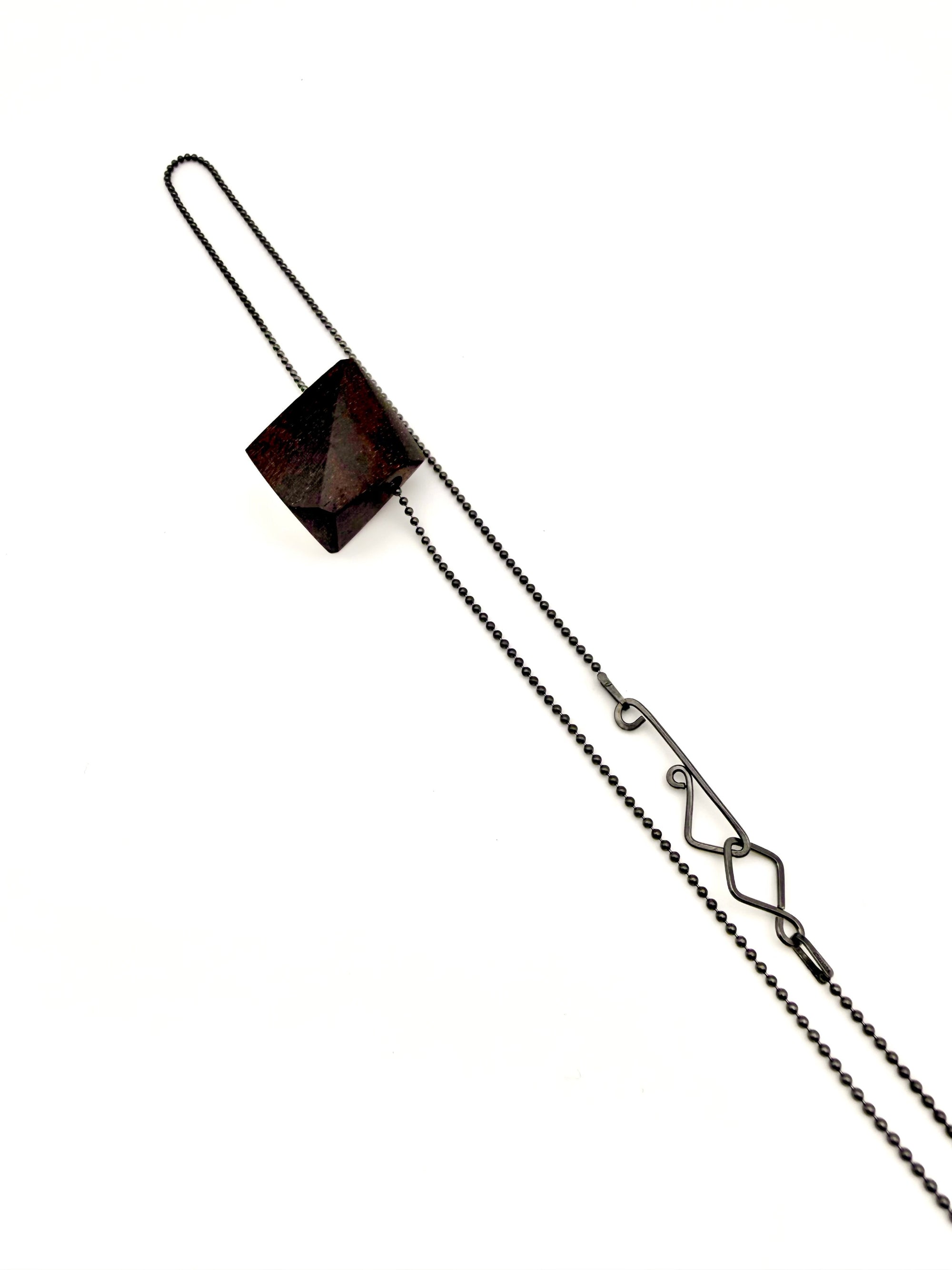 Geometric wood pendant necklace with Oxidized Silver Ball Chain and custom clasp on a white background