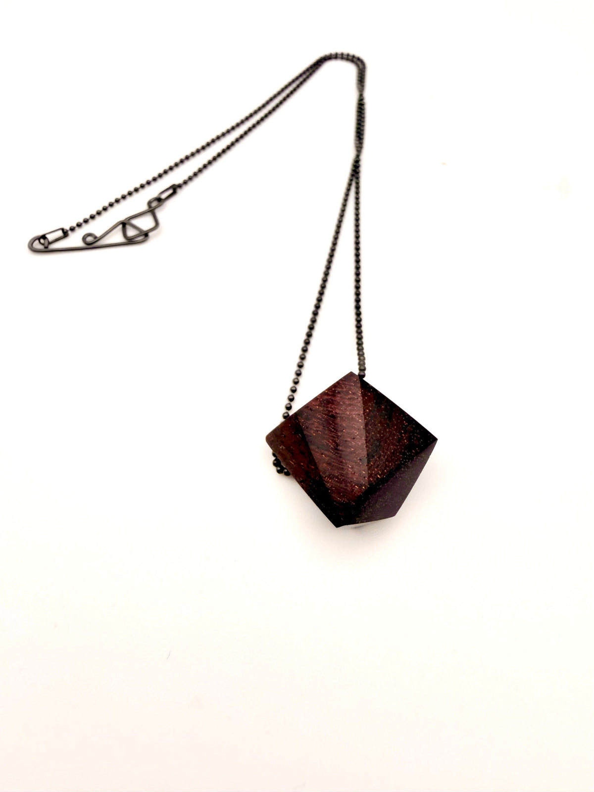 Geometric wood pendant necklace with Oxidized Silver Ball Chain and custom clasp on a white background