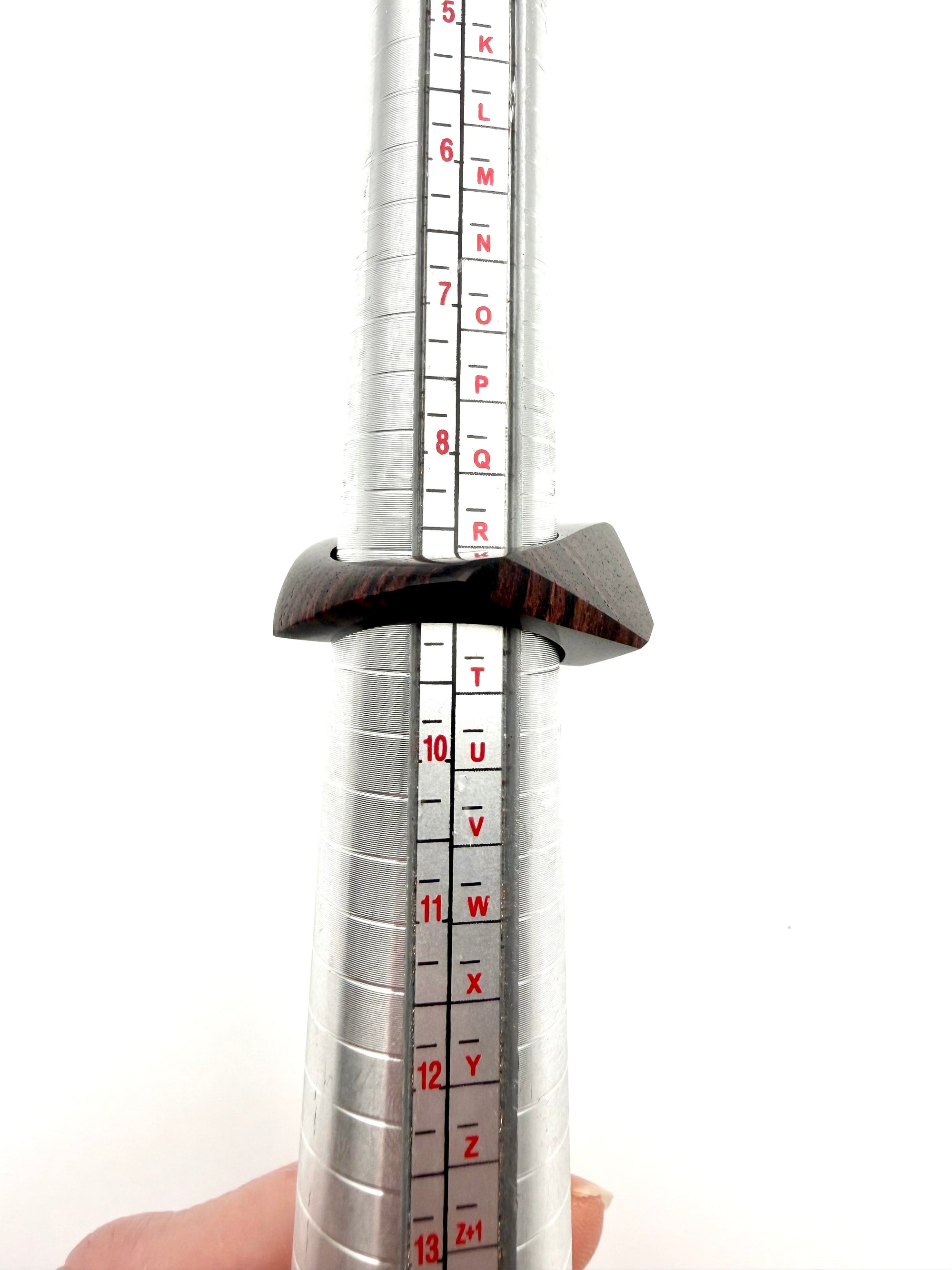 Wood ring on ring sizer for reference