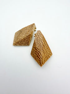 Blonde wood earrings with dramatic end grain. 