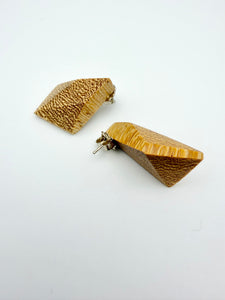 Blonde wood earrings with dramatic end grain with side detail.