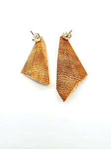 Back view of wood triangle-shaped earrings with silver posts and backs on a white background